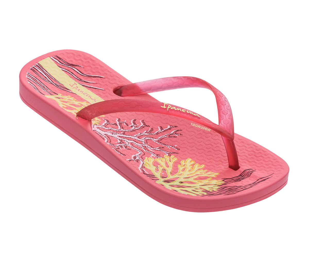 Angled view of a pink Ipanema Ana Glossy flip flop kids with an under the sea print on the footbed.