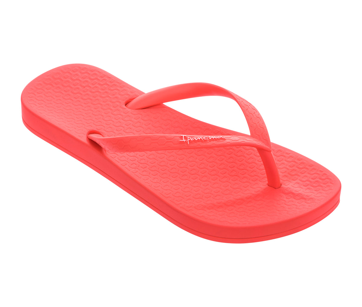 Angled view of a neon pink Ipanema Ana Colors kids flip flop.